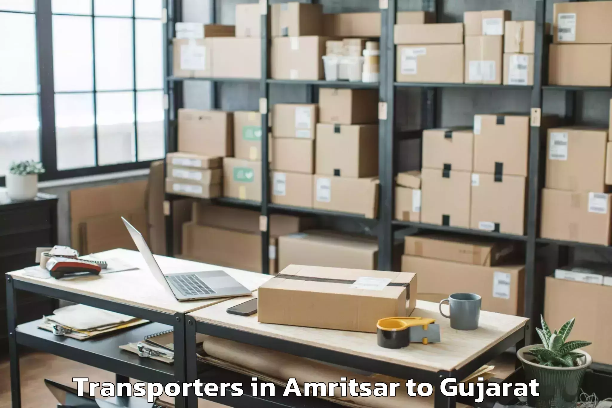 Top Amritsar to Sanand Transporters Available